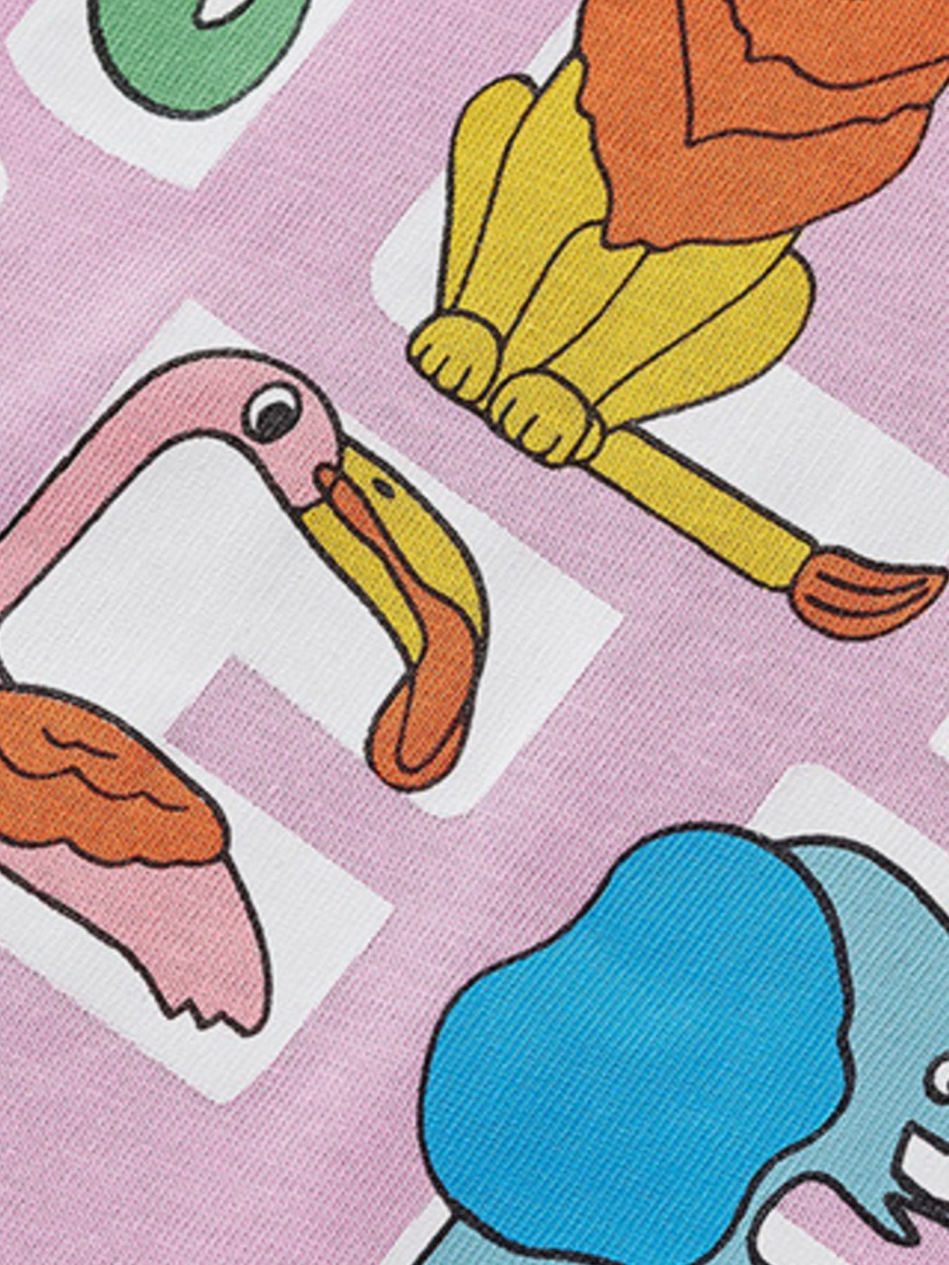 Close-up print detail showing lion, flamingo and elephant animal letters on pink children's T-shirt
