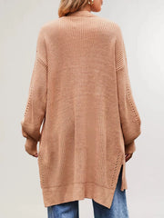 Back view of the apricot long open front cardigan with openwork sleeves