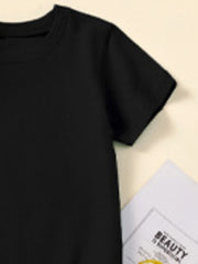 Close-up of the short sleeve and shoulder seam on a black children's T-shirt