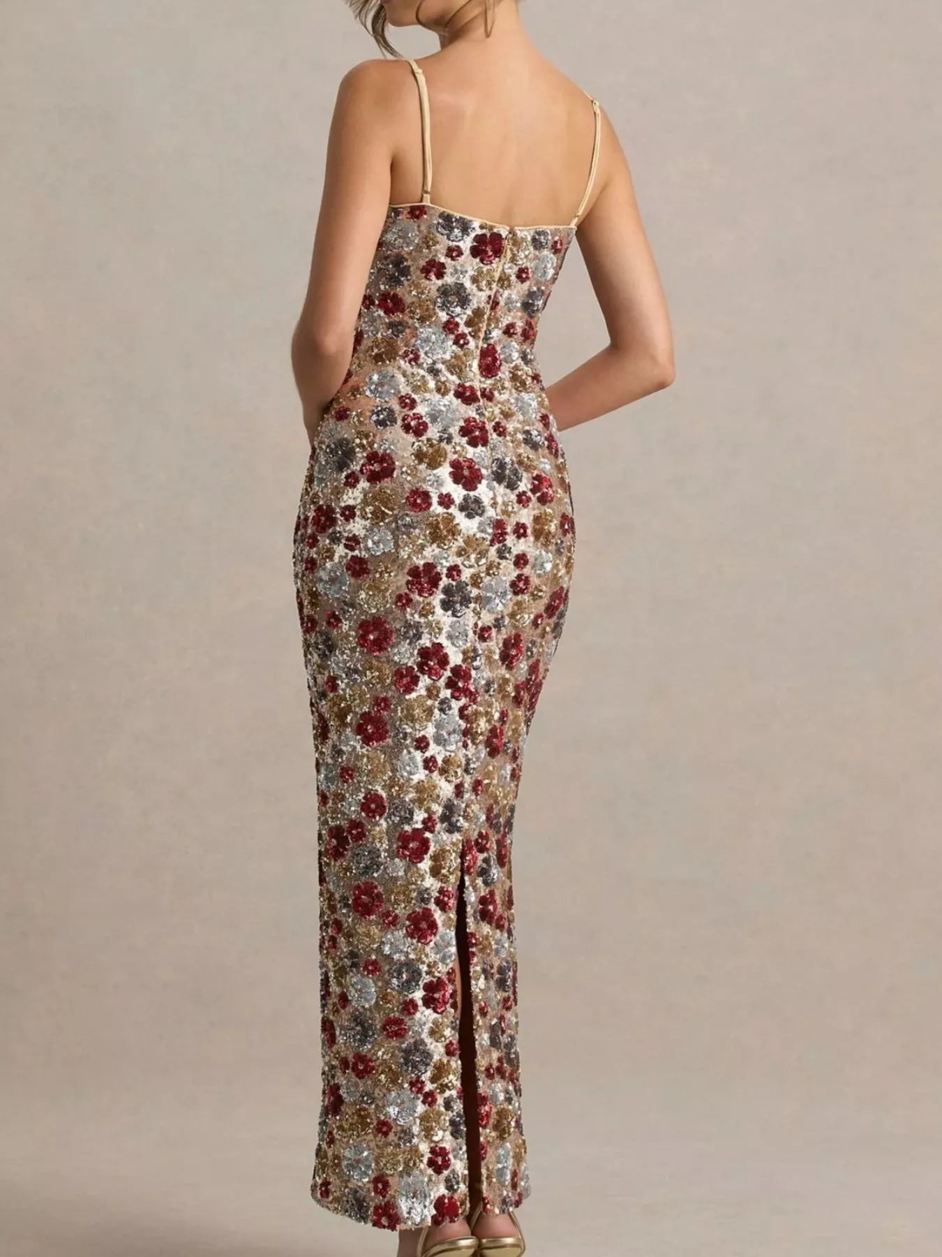 Back view of the multicolor floral sequin bodycon maxi dress showing the rear slit