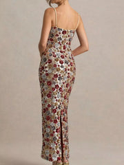 Back view of the multicolor floral sequin bodycon maxi dress showing the rear slit