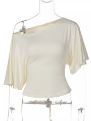 Cream boat-neck short-sleeve T-shirt displayed on a clear mannequin hanger.