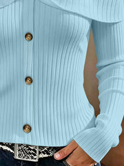 Close up of light blue cold shoulder ribbed knit top bodice showing ribbing and front buttons