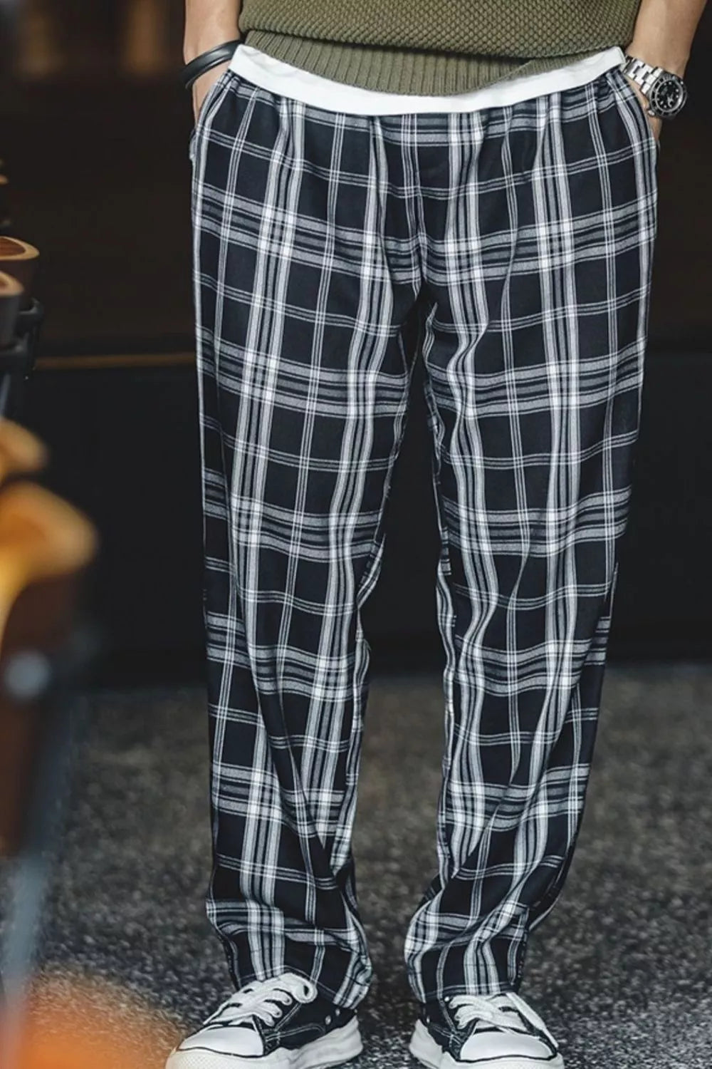 Men's black plaid casual pants, available in plus sizes.