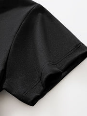 Close view of the short sleeve hem and double stitching on the black children's T-shirt