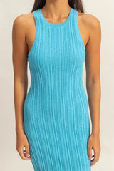 Close front view of bright blue ribbed knit bodycon dress showing round neckline and knit texture