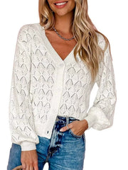 Front view of white openwork leaf knit cardigan with V neck and button front.