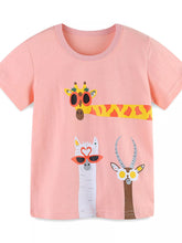 Flat lay front view of pale blush children's t-shirt with giraffe llama and antelope cartoon prints