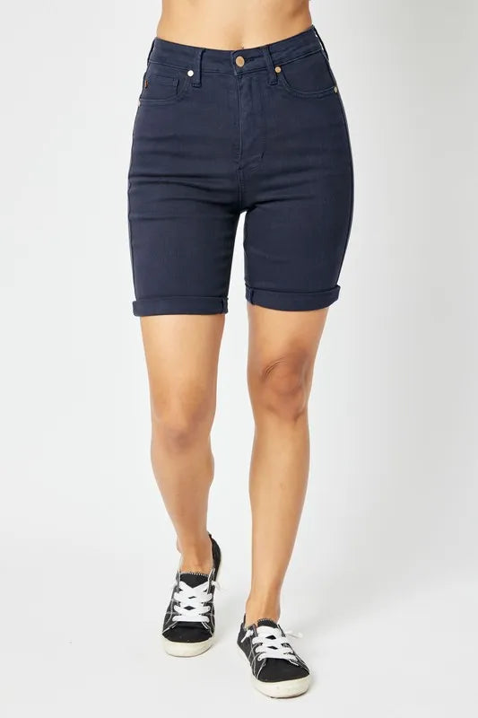 Women's dark blue Bermuda shorts with a high waist.