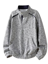 Men's textured sweatshirt with a stand collar and kangaroo pocket.