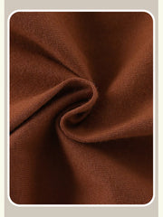 Close-up of soft dark brown cotton fabric texture with gentle folds
