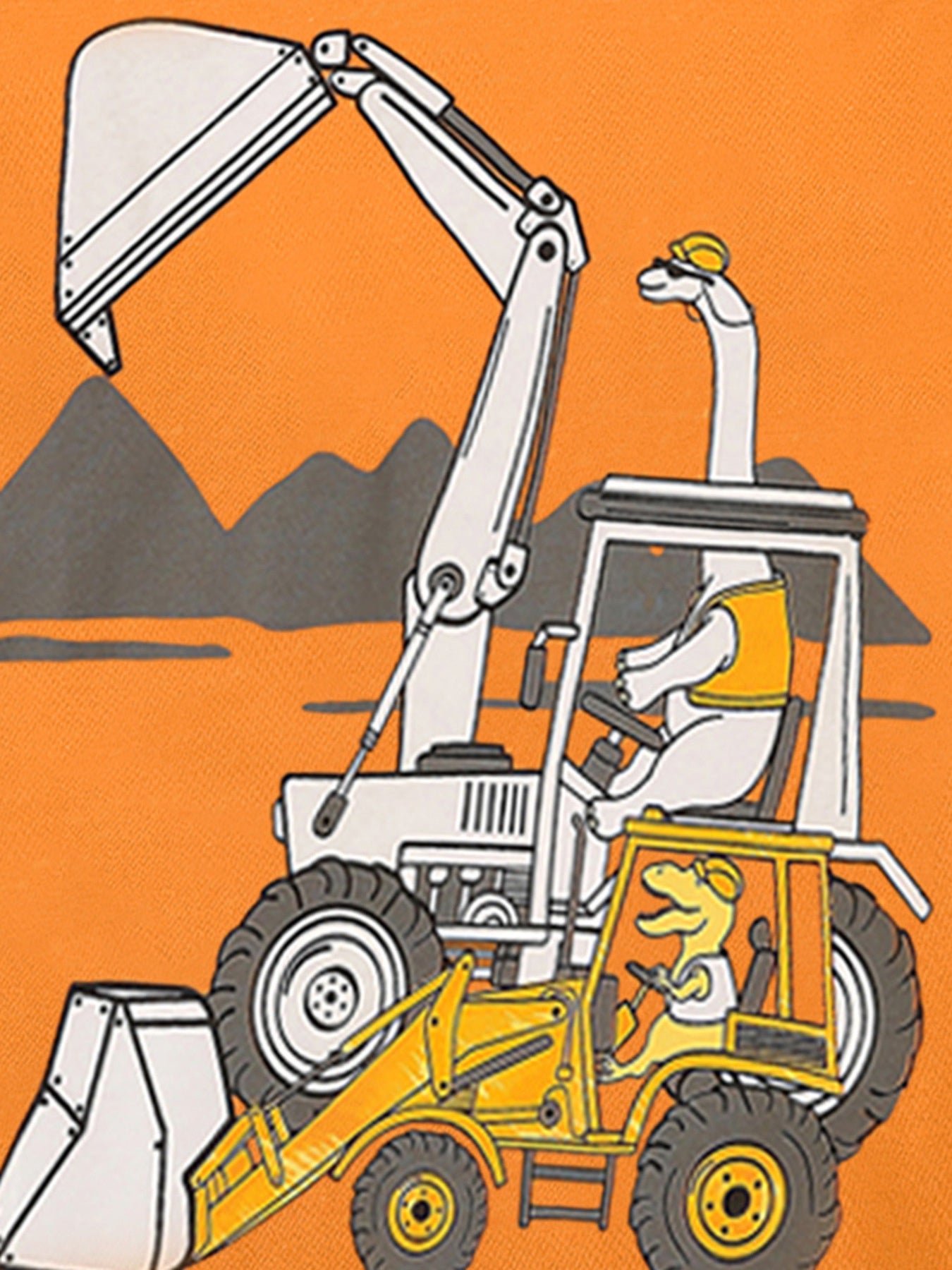 Close-up of the dinosaur driving an excavator graphic on an orange children's short sleeve T-shirt