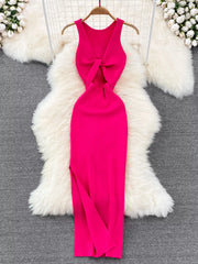 Rose red sleeveless knit bodycon midi dress, back view with knotted open back on hanger