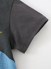 Close-up of the gray short sleeve hem with double stitching on a children's T-shirt