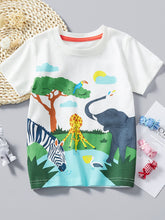 White children's round neck t-shirt laid flat with elephant zebra and giraffe safari print