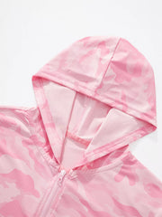 Close view of the blush pink camouflage hood and zip top on the children's jacket