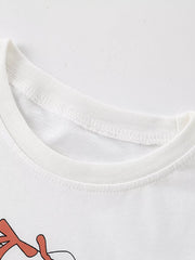 Close-up of white children's t-shirt ribbed crew neckline and stitching, with bunny graphic below