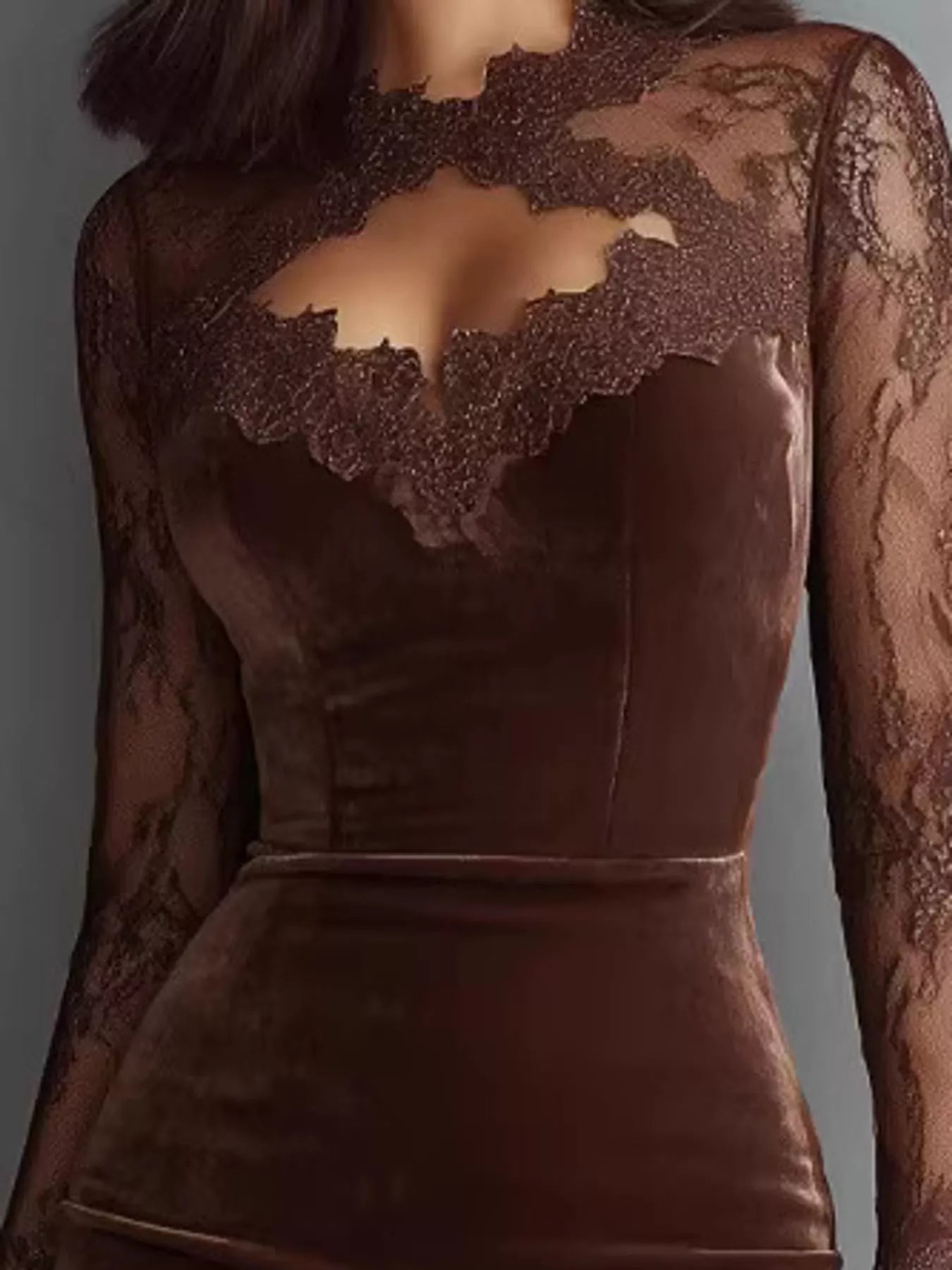 Detail view of the lace cutout bodice of a coffee long sleeve velvet bodycon dress