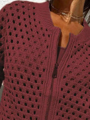 Close up of the wine red crochet cardigan upper zip and openwork pattern