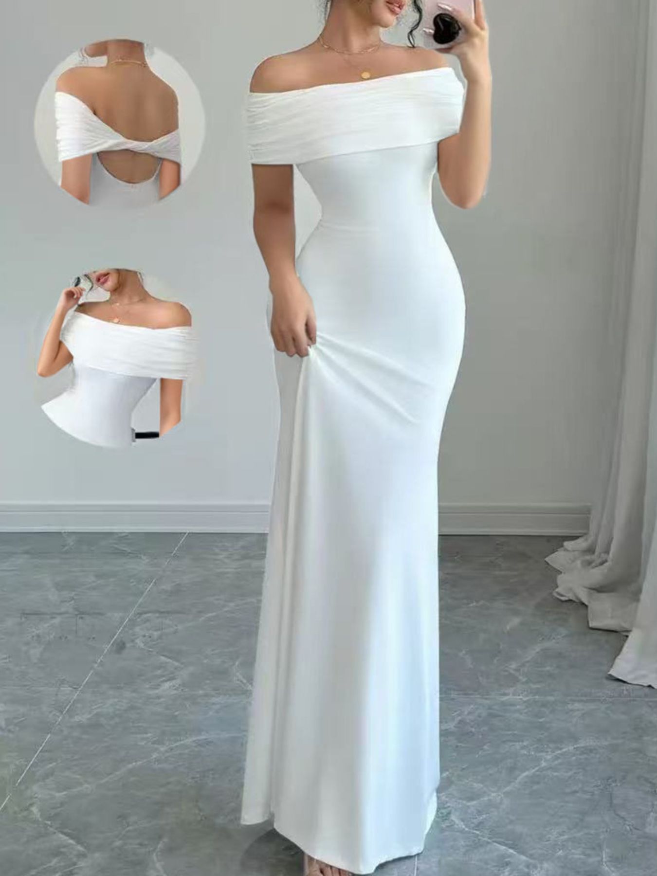 Model in full length mirror selfie wearing white off shoulder bodycon maxi dress with back detail insets