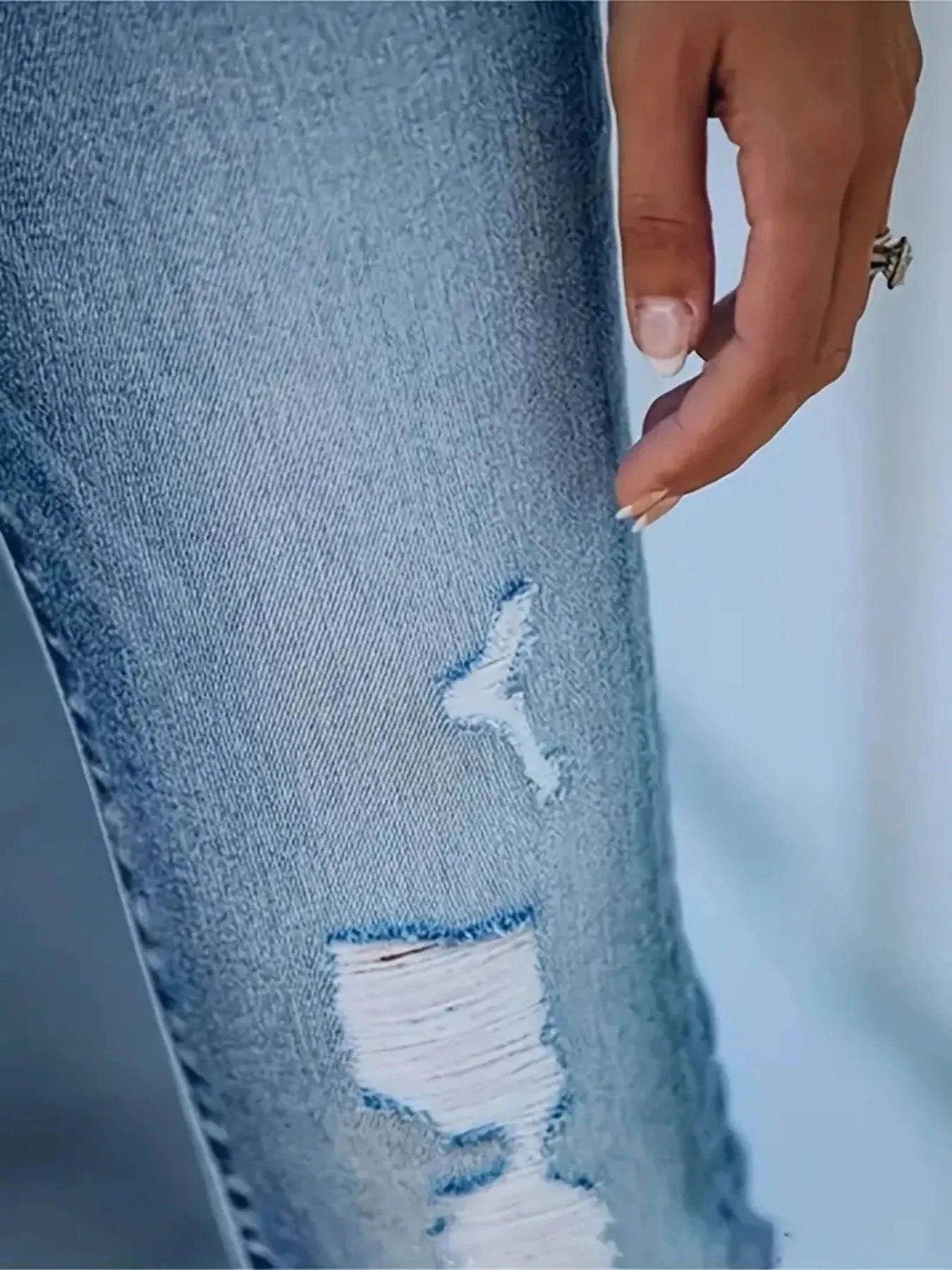 Distressed High-Waisted Skinny Jeans
