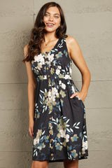 Double Take Printed Scoop Neck Sleeveless Buttoned Magic Dress with Pockets Black / S