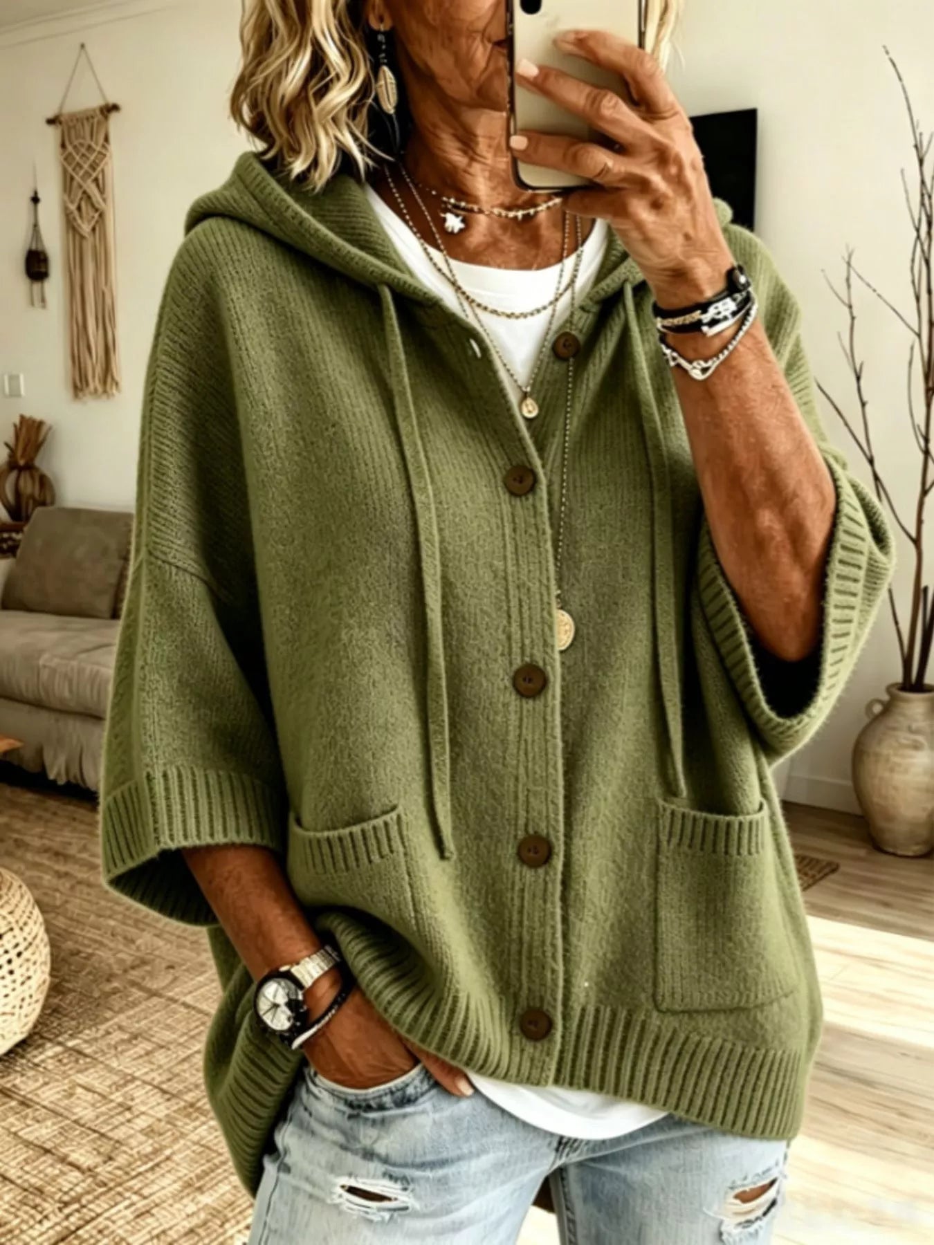 Army Green hooded knit cardigan with brown buttons and patch pockets shown from the front on model