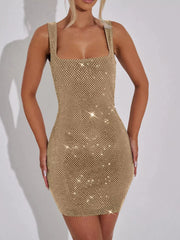 Gold rhinestone mesh bodycon mini dress worn on model, front close view