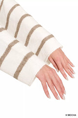 Close up of cream striped sweater sleeves with mocha stripes and wide cuffs.