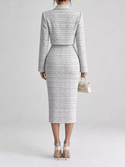 Back view of black and white tweed dress worn with the cropped cardigan