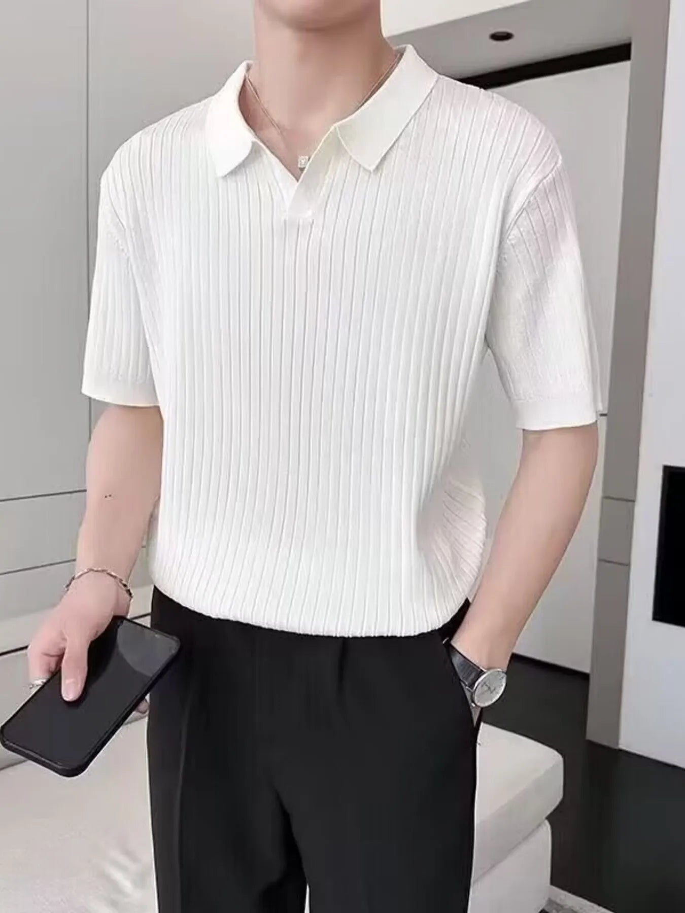 Men's textured short-sleeve knit polo featuring ribbed fabric.