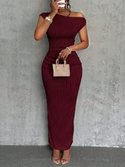 Front mirror view of a burgundy asymmetrical one shoulder ribbed bodycon maxi dress