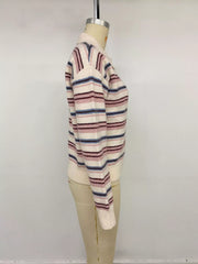 Side view of a cream striped polo sweater with long sleeves on a mannequin