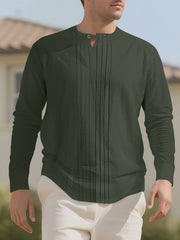 Men's pleated long-sleeve blouse with button detailing in a cotton-spandex blend.