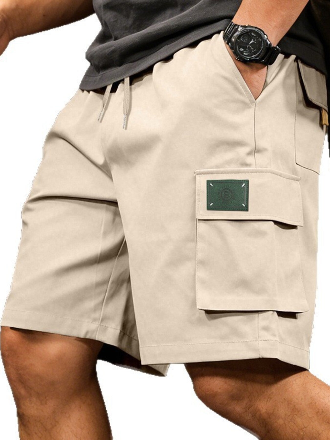 Men's apricot cargo shorts with a drawstring waist and pockets.
