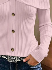 Close up of light pink cold shoulder ribbed knit top bodice showing ribbing and front buttons
