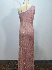 Pink sequin one shoulder evening dress shown from the back on a dress form
