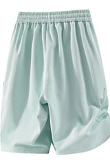 Men's lightweight shorts with a drawstring waist and pockets.