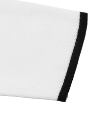 Close up of white knit sleeve cuff with narrow black trim.
