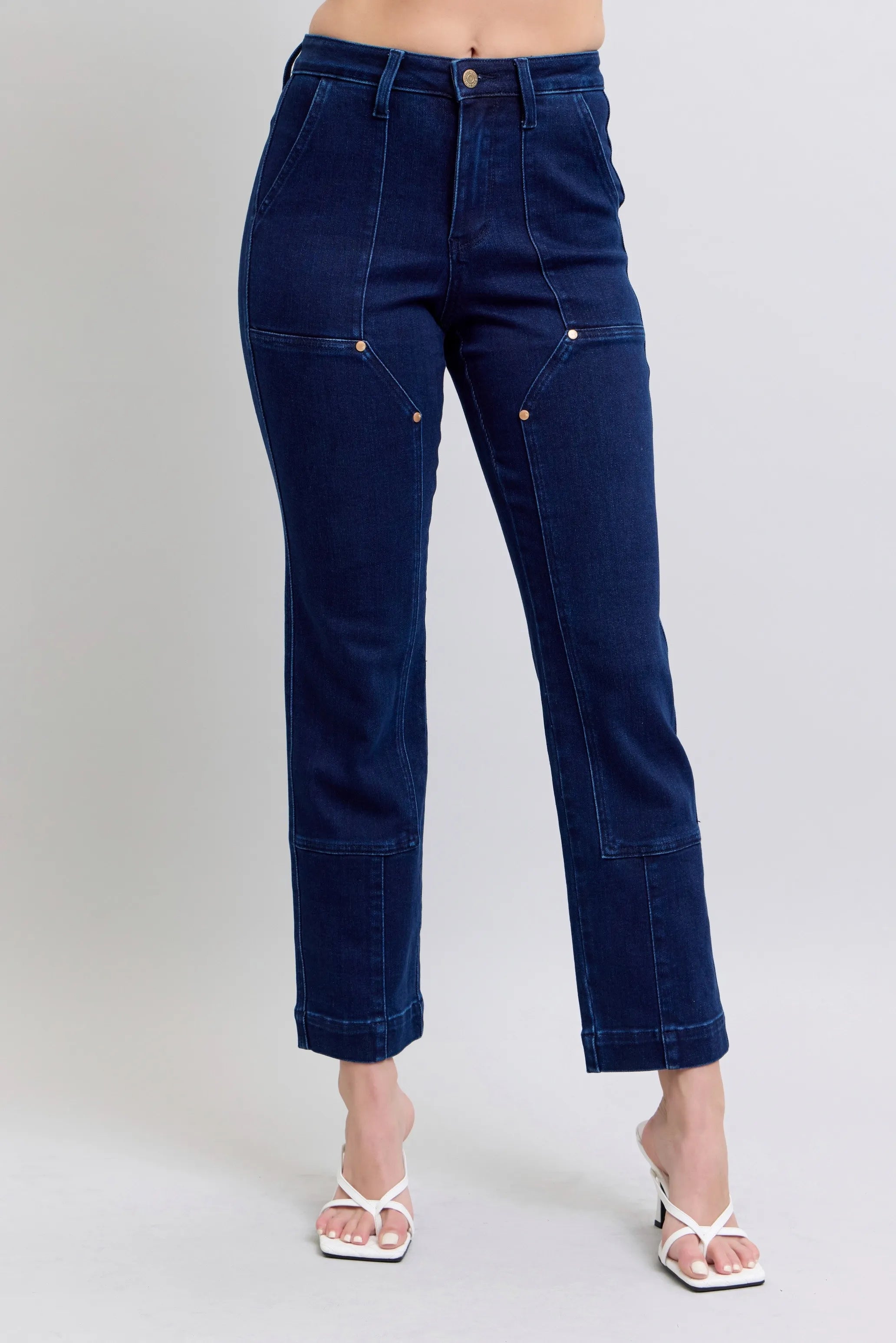 Women's high-waisted straight-leg jeans with pockets.