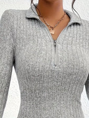 Close up of gray ribbed knit mini dress collar and half zip neckline
