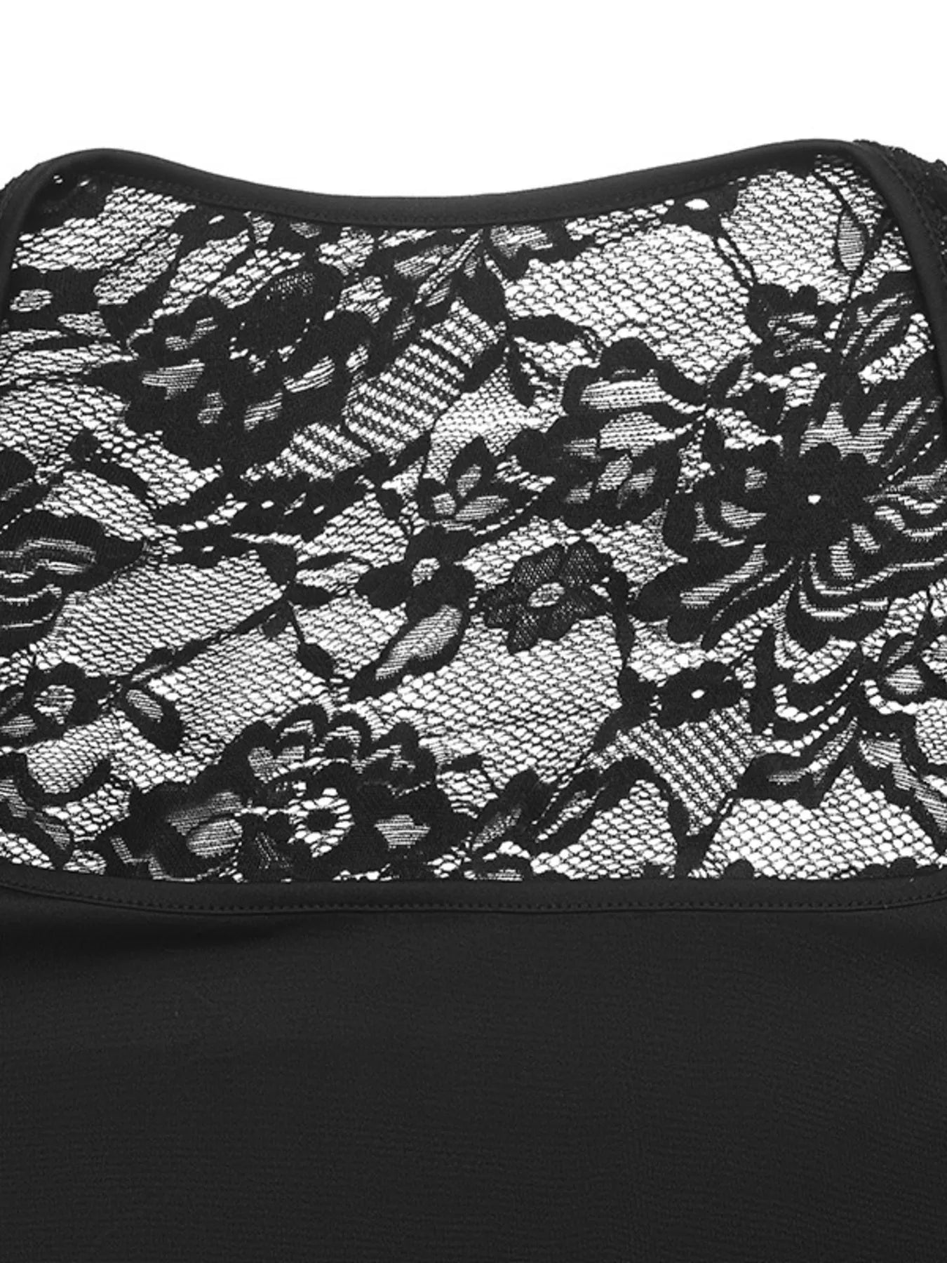 Close-up detail of black floral lace sleeve and square neckline on the top