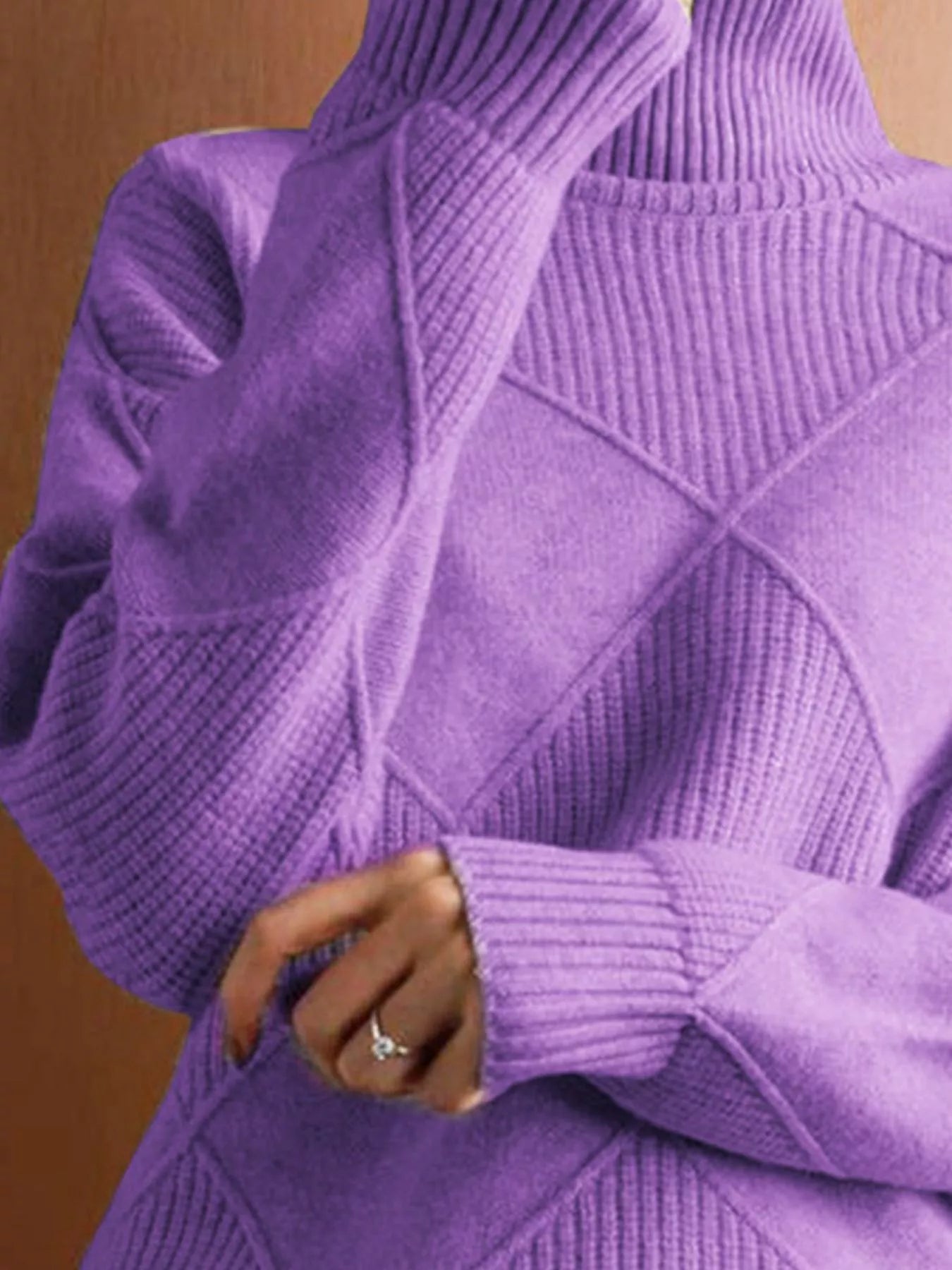 Close torso view of the lavender turtleneck sweater with diamond knit panels