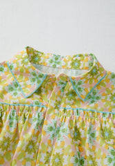 Blusa de manga larga con cuello y estampado de volantes