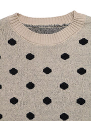 Close up flat lay of khaki polka dot sweater ribbed round neckline detail