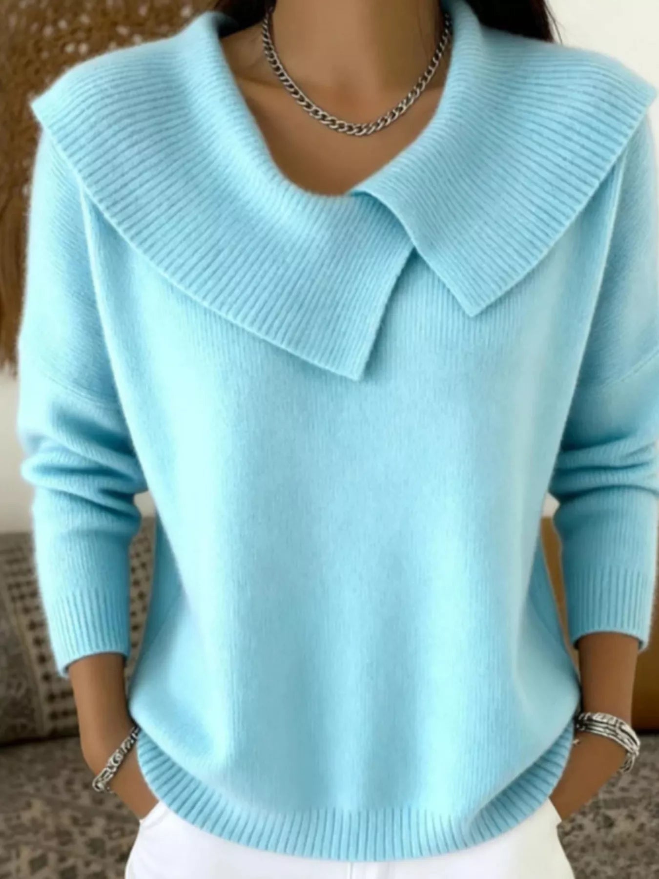Light blue wide collar ribbed knit sweater with overlapping collar and long sleeves, front view