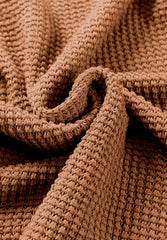 Blusa con cuello redondo, mangas abullonadas y botones decorativos