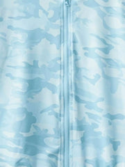 Close view of the pastel blue camouflage fabric and center zip on the children's jacket