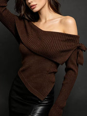 Brown off shoulder ribbed knit top with side bow tie and asymmetric hem, front angle view