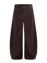 Men's corduroy pants with a wide leg silhouette.